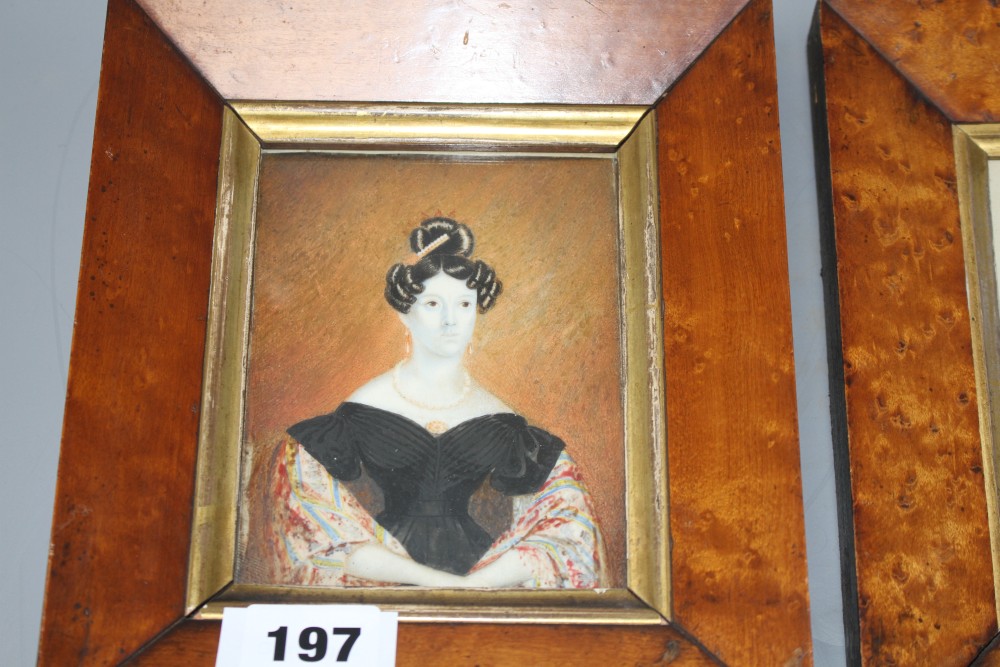 A Victorian painted ivory miniature portrait of a seated lady, 12 x 9cm, maple framed, and a coloured engraving, in near matching frame
